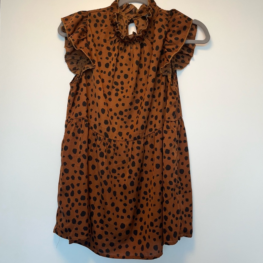 High Neck animal print blouse. Never warn / Size M